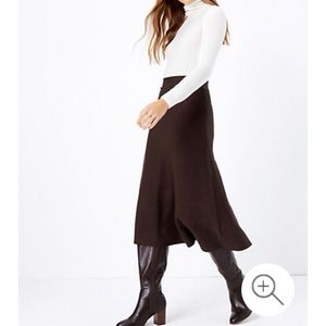 Knitted fitted and flared skirt